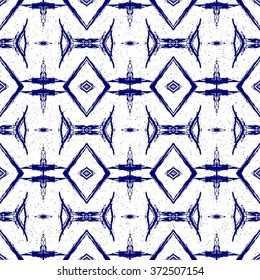 Aztec seamless pattern. Striped hand painted seamless pattern with ethnic and tribal motifs, zigzag lines, brush strokes and splatters. Ikat Mexican motif. Vector illustration. Zigzag and stripe line.