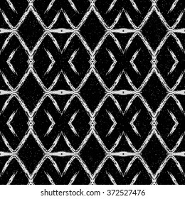 Aztec seamless pattern. Striped hand painted seamless pattern with ethnic and tribal motifs, zigzag lines, brush strokes and splatters. Ikat Mexican motif. Vector illustration. Zigzag and stripe line.