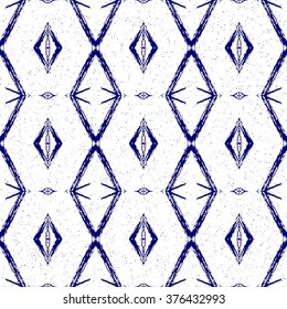 Aztec seamless pattern. Striped hand painted seamless pattern with ethnic and tribal motifs, zigzag lines, brush strokes and splatters. Ikat Mexican motif. Vector illustration. Zigzag and stripe line.
