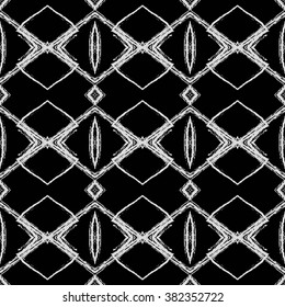 Aztec seamless pattern. Striped hand painted seamless pattern with ethnic and tribal motifs, zigzag lines, brush strokes and splatters. Ikat Mexican motif. Vector illustration. Zigzag and stripe line.