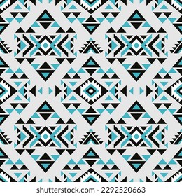 Aztec style blue seamless geometry pattern with tribal ornament. Ornamental ethnic background collection. Use for fabric prints, surface textures, cloth design, wrapping. 