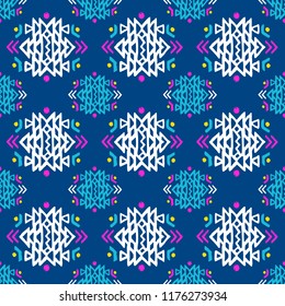 Aztec style seamless geometry pattern with tribal ornament. Ornamental ethnic background collection. Use for fabric prints, surface textures, cloth design, wrapping. EPS 10 vector illustration.