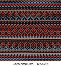 Aztec stylized seamless pattern. Bright colored ethnic print template for textile and paper. Boho chic design. Summer fashion. Abstract background with folk motives. 