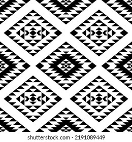 Aztec stylized seamless pattern. Ethnic print template for textile and paper. Boho chic design. Abstract background with folk motives. Black and white.