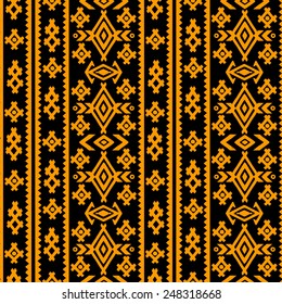 Aztec tribal art seamless pattern in black and gold. Ethnic mexican print. Folk border repeating background texture