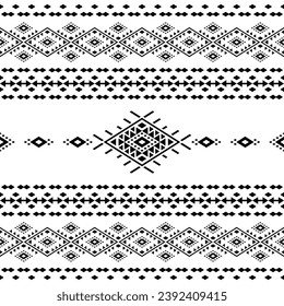 Aztec tribal motif with contemporary Native American style. Geometric seamless ethnic pattern. Black and white colors. Design for carpet, curtain, textile, fabric, mat, embroidery, fashion, ikat.