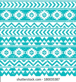 Aztec tribal seamless grunge white pattern on blue background 