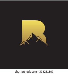 B alphabet mountain negative space letter logo gold black background