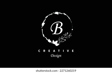 B letter logo in white water color on black background Vector abstract design element.