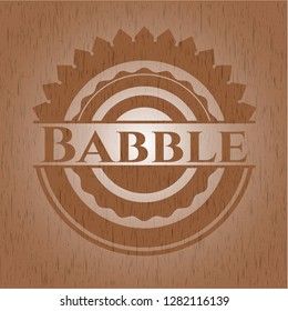 Babble badge with wooden background
