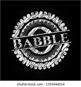 Babble written on a chalkboard