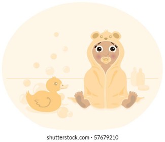 Baby of african descent in a hooded towel with cute bear ears.