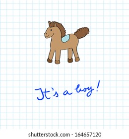 Baby arrival card with toy horse cartoon over a math paper pattern with blue hand drawn text