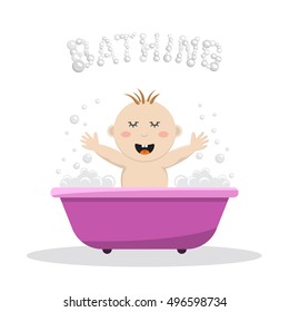Baby bathing in a small bath, with bath foam and soap bubbles. A joyful baby takes a bath, body hygiene of the infant. Game baby in the bath water.