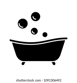 Baby bathtub glyph icon. Taking bath. Silhouette symbol. Negative space. Vector isolated illustration