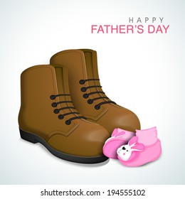 Baby booties with father leather shoe on grey background, concept for Happy Father's Day celebrations.