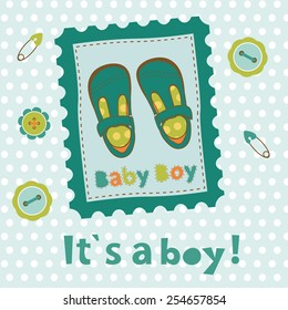 Baby boy card with little shoes  in frame. vector illustration