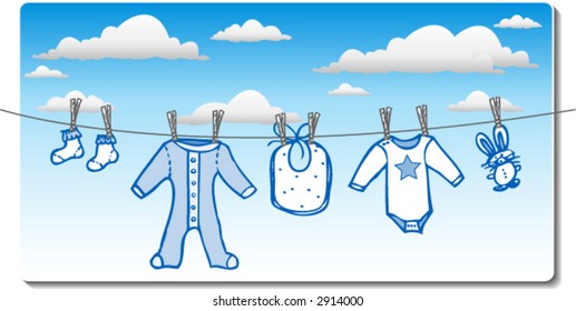 Baby boy clothes drying on clothes line