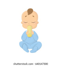 Baby boy eating.