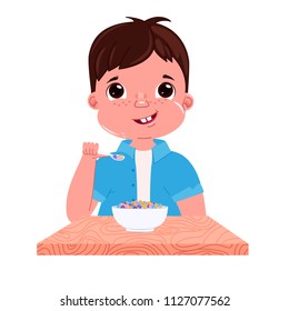 A baby boy eats breakfast in the morning. Sweet dish colorful corn flakes with milk. Vector cartoon illustration