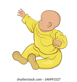 The baby boy or baby girl in yellow pajamas sitting 