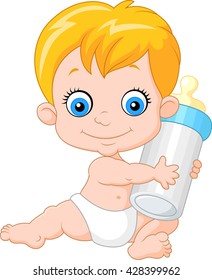 Baby boy holding milk bottle 