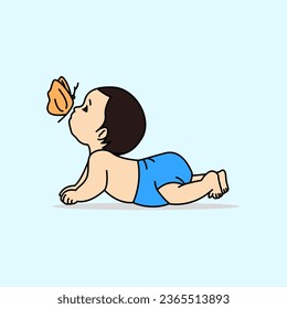 Baby boy playing with butterfly. Baby wearing blue pants.