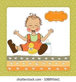 baby boy playing with his duck toy, welcome baby card
