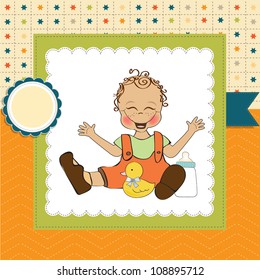 baby boy playing with his duck toy, welcome baby card