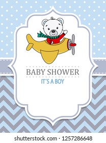 baby boy shower card. Bear flying on plane. Space for text