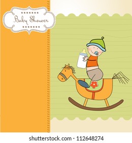 baby boy shower shower with wood horse toy