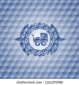 baby cart icon inside blue emblem or badge with geometric pattern background.