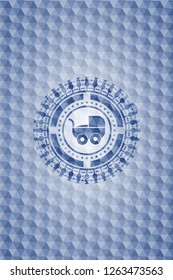 baby cart icon inside blue badge with geometric background.