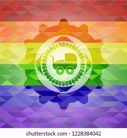baby cart icon inside emblem on mosaic background with the colors of the LGBT flag