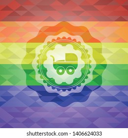baby cart icon inside emblem on mosaic background with the colors of the LGBT flag