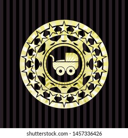 baby cart icon inside golden badge or emblem