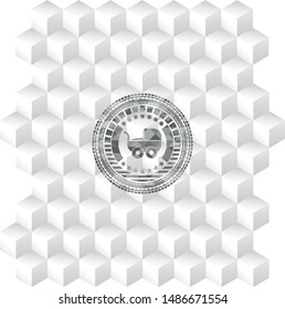 baby cart icon inside grey badge with geometric cube white background