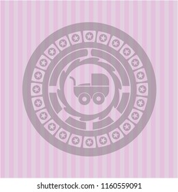 baby cart icon inside pink emblem