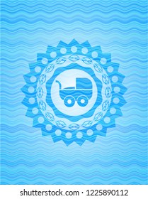 baby cart icon inside sky blue water emblem.