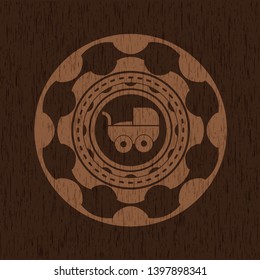 baby cart icon inside wood emblem. Retro