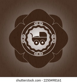 baby cart icon inside wood emblem. Vintage. 