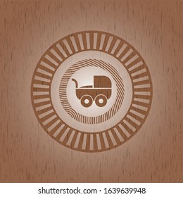 baby cart icon inside wooden emblem. Vintage.