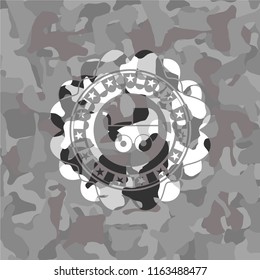 baby cart icon on grey camo texture