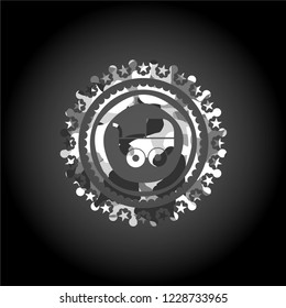 baby cart icon on grey camouflaged pattern