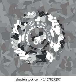baby cart icon on grey camouflage texture