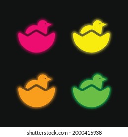 Baby Chicken And Half Egg Shell four color glowing neon vector icon