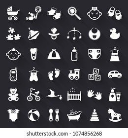 Baby and childhood web icons. Set of white flat symbols with long shadows isolated on black background. Children's toys, food, clothes. Newborn and kids, feeding and care themes. Vector collection.