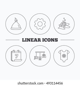 Baby clothes, bath bubbles and hat icons.