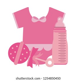 baby clothes with maraca and bottle