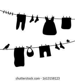 Baby clothes on clothesline. Laundry silhouette illustration. Kid apparel after washing hanging on a rope. For newborn, girl or boy. Vector isolated on white